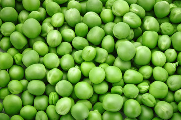 Obraz na płótnie Canvas The texture of ripe green peas.