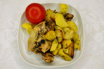 chicken with potatoes and tomatoes