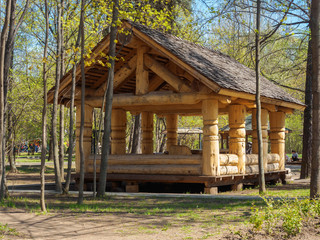 Arbor in a park of logs. Relax in the summer.