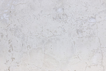 old plaster wall with cracks