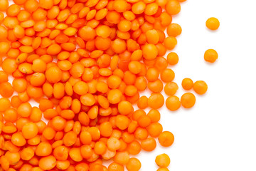 Red lentils on a white background