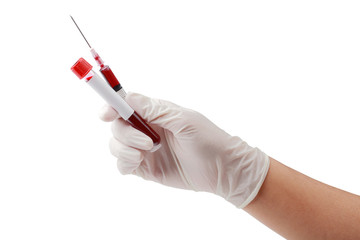 Hand holding test tube with blood plasma and a syringe for testing with clipping path.