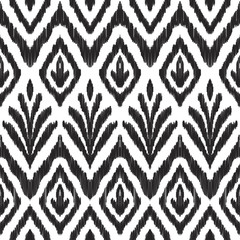 Ikat seamless pattern. Fancy textile design. Vector illustration in white and black colors. Tapestry print in ethnic style. - 161106280