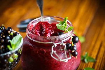 Berry ripe black currant with jam