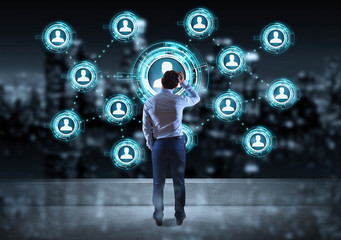 Businessman watching social network interface on a rooftop 3D rendering