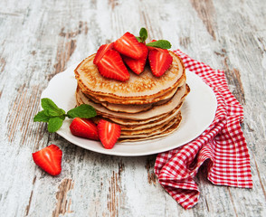 Pancakes with fresh strawberries