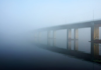 Misty landscape with bridge