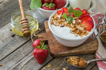 Breakfast - yogurt with granola and straberries