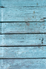 Obraz premium Wall of old wooden boards, painted in blue