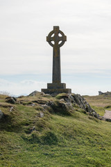 Fototapeta na wymiar Celtic cross on Llanddwyn Island in Anglesey, North Wales