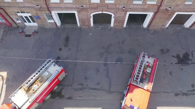 fire trucks leave the fire station