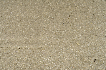 Footsteps in the sand at The Black Sea shore in Gura Portitei, Romania