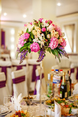 Beautiful bouquet. Decor on the table. The concept of a party and wedding decor.
