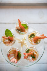 Selective focus on Spicy Prawn or Shrimp steamed with lemon salads and mint on top, Thai Food