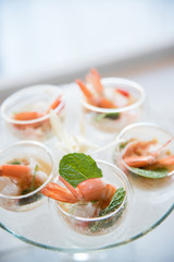 Selective focus on Spicy Prawn or Shrimp steamed with lemon salads and mint on top, Thai Food