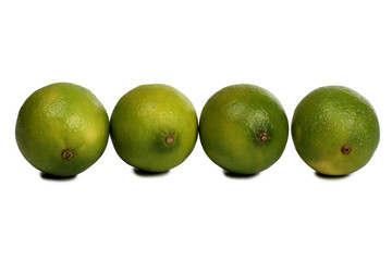 Green lemon fruits on a white background