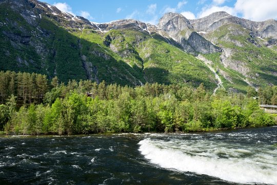 Eio, short but well watered river between the lake Eidfjordvatnet and the Eidfjorden in Norway