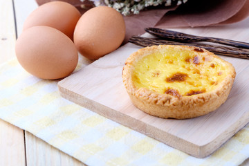 Egg tart on wooden background