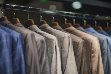 Obraz premium Men suits in detail in a store