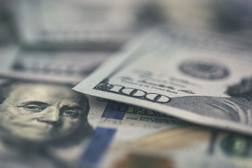 Money concept - detail of 100 dollar bills