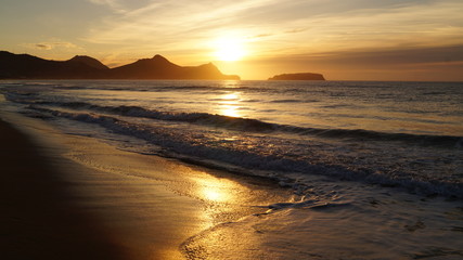 Sunrise over Beach and Sea