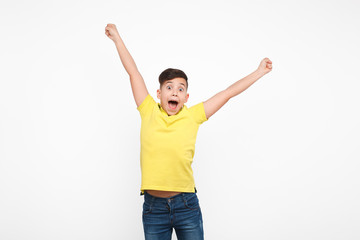 Excite boy posing with hands up © kegfire