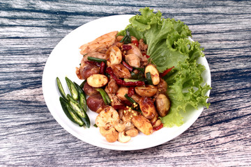 Spicy fried jackfruit seeds and chicken with roasted chile paste.