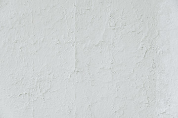 Old white cracked painted wall background texture