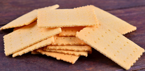 Tasty biscuits on wood