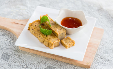 Pork fried in white dish