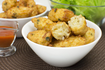 Fried rice balls with one open