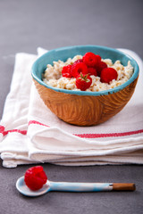 Oatmeal Porridge with fresh Berries,Raspberry.Breakfast.Concept of Healthy Eating. Copy space.selective focus.