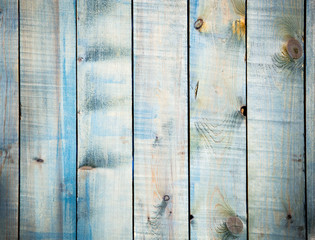 The wooden background is painted in blue