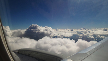 Fototapeta na wymiar Sky with clouds in the plane