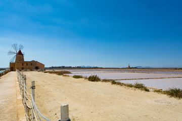 Salt mills are seen in suburbs of Marsala, Sicily, Italy.