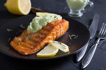 Grilled salmon with avocado sauce