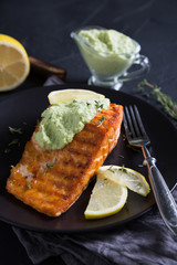 Grilled salmon with avocado sauce