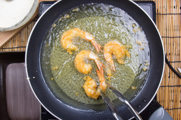 Chef frying shrimp Tempura