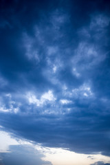 Obraz premium Beautiful clouds at sunset after rain as background .