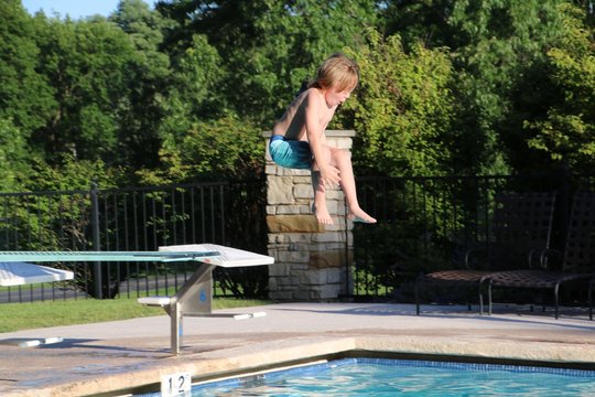 Boy On Diving Board