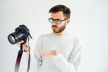 Male potographer thinking