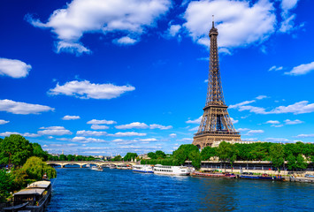 Paris Eiffel Tower and river Seine in Paris, France. Eiffel Tower is one of the most iconic landmarks of Paris. - obrazy, fototapety, plakaty