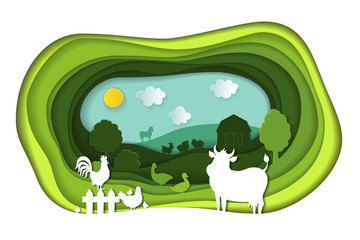 Paper art carving of landscape with farm animals.