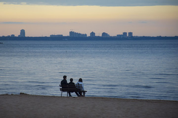 Sunset on the shore of the bay