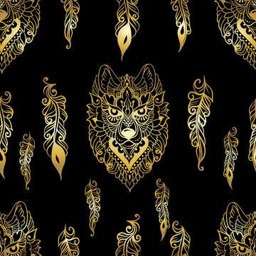 Seamless pattern with wolf and feathers in ethnic style - gold line art on a black background