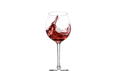 A glass of wine in motion on the white background