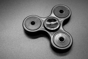 Black fidget plastic spinner