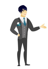 Groom with arm out in a welcoming gesture.