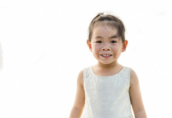 Naklejka premium Asian little girl in smiling face