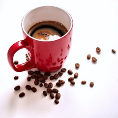 cup of coffee with coffee beans